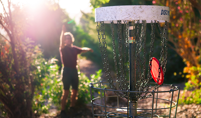 Midway disk golf throw.